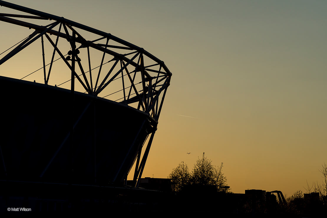 Olympic stadium in London in silhouette